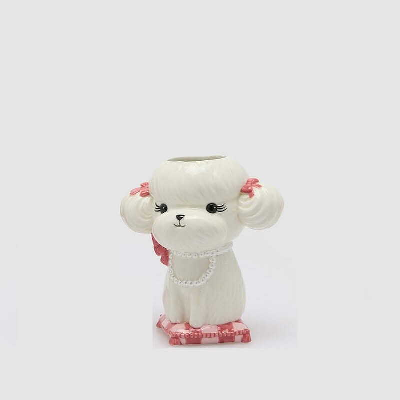 Vaso a forma di cane bianco con collana su cuscino in ceramica